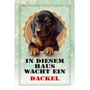 Schild Spruch "In diesem Haus wacht ein Dackel"...